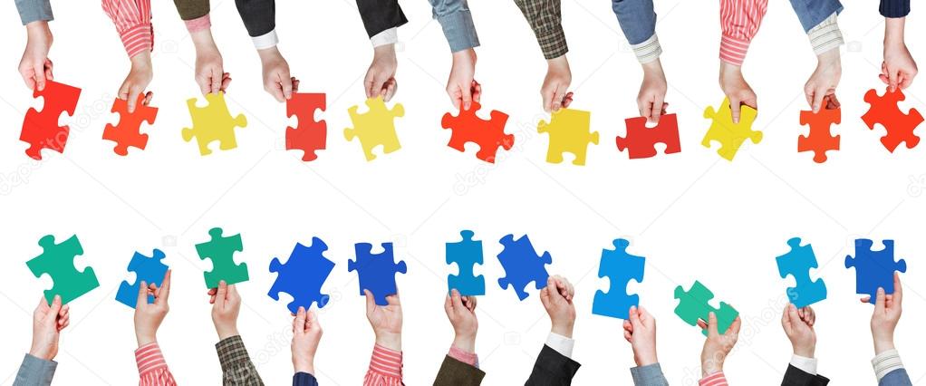 set color puzzle pieces in people hands