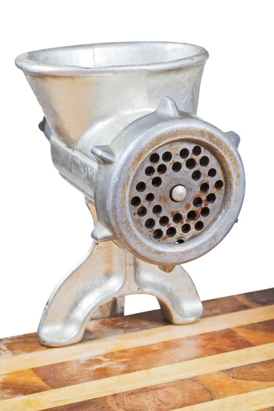 Old iron meat grinder mounted on table — Stock Photo, Image