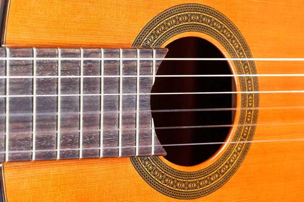 Fingerboard and sound hole of acoustic guitar — Stock Photo, Image