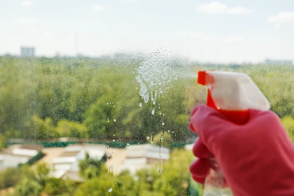 Jet from spray bottle and green park outside — Stock Photo, Image