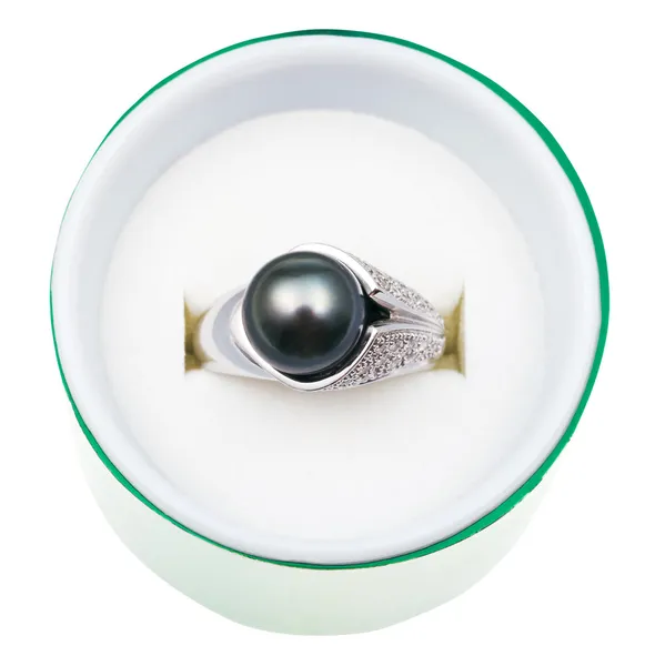 Top view of white ring with black pearl in box — Stock Photo, Image