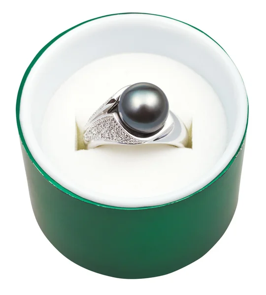 Above view of white ring with black pearl in box — Stock Photo, Image