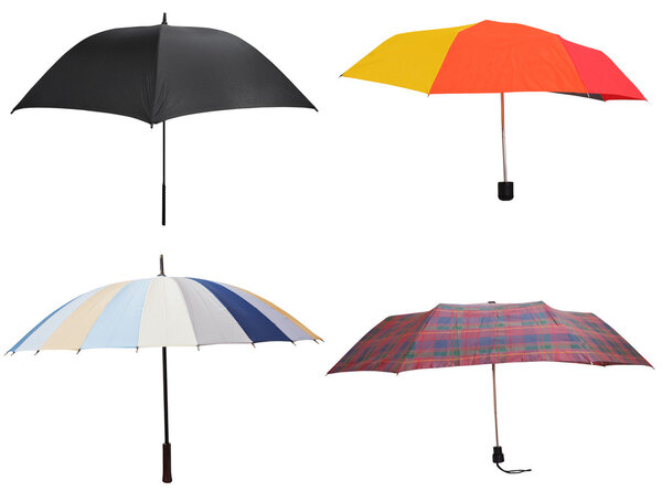 side view of four different open umbrellas