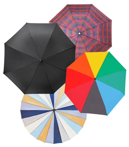 Quatre parapluies ouverts différents isolés sur blanc — Photo