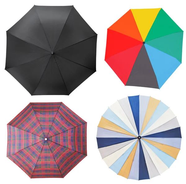 Vue de dessus de quatre parapluies ouverts différents — Photo