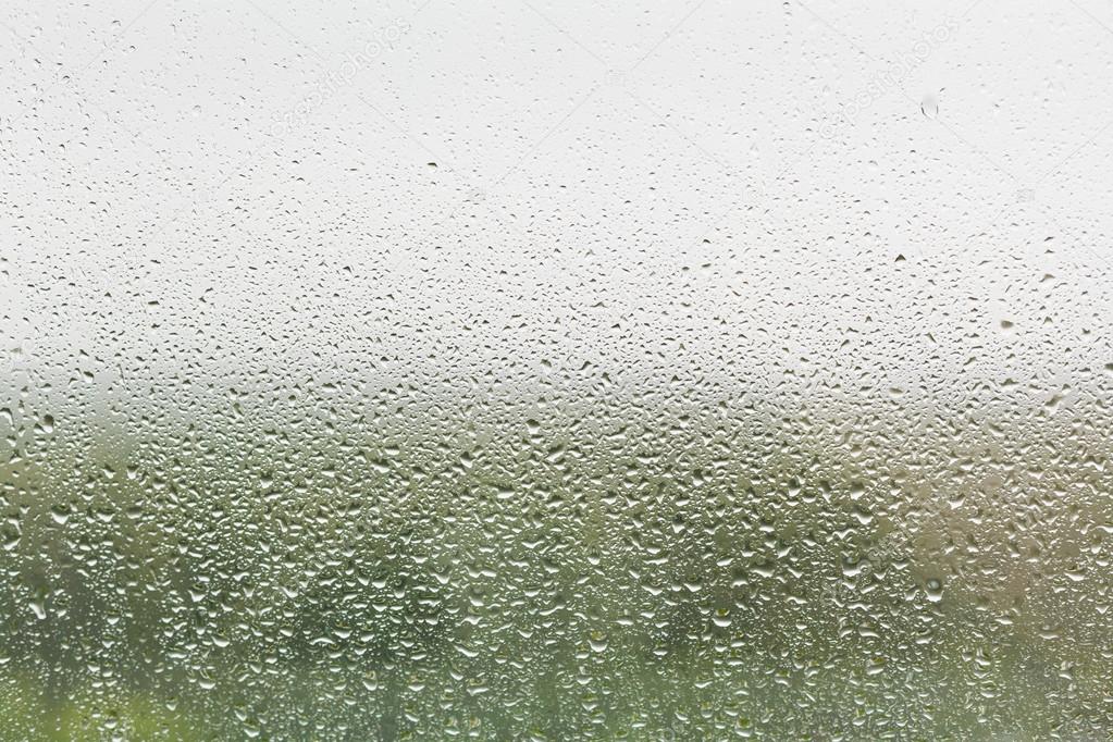 raindrops on home window glass