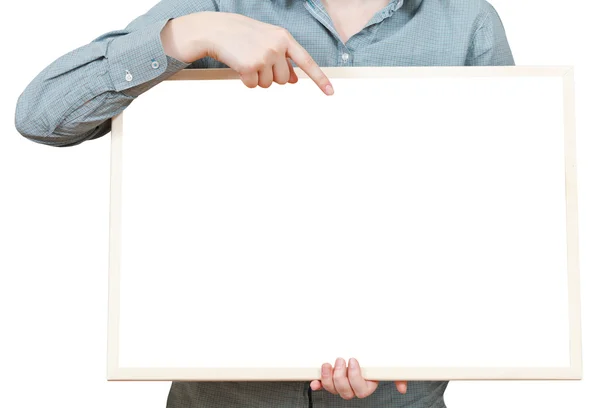 Finger points on blank bulletin board in hand — Stock Photo, Image