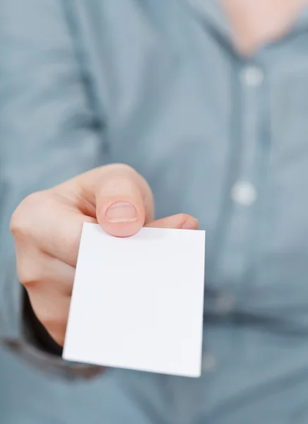 Blank business card in hand — Stock Photo, Image