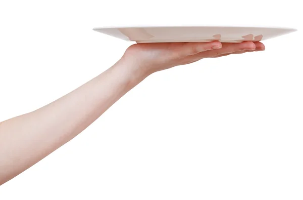 Empty white plate on hand isolated — Stock Photo, Image