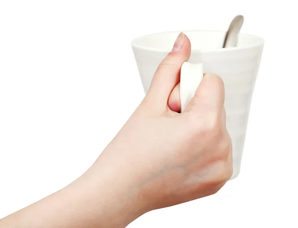 Tazza bianca isolata in mano — Foto Stock