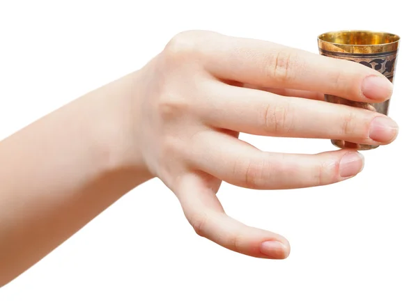Ruce drží malý kovový skla s duchem — Stockfoto