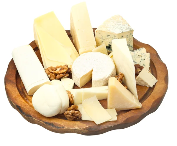 Wood plate with various cheeses — Stock Photo, Image