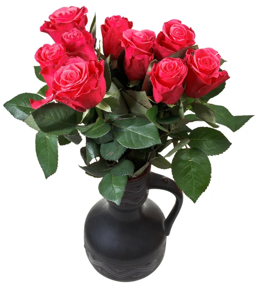 Ramo de rosas rojas en jarra de cerámica negra —  Fotos de Stock