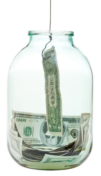 Catching saving dollars from glass jar — Stock Photo, Image