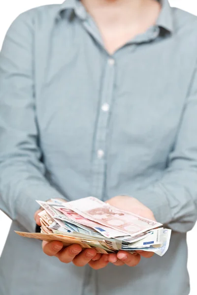 Cumulo di banconote in euro in palme a coppa — Foto Stock