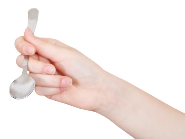 Hand with empty teaspoon isolated — Stock Photo, Image