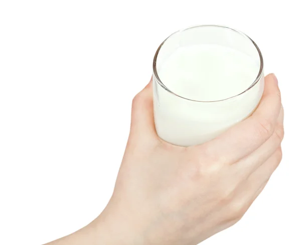 Vista sopra di mano che tiene il vetro di latte — Foto Stock