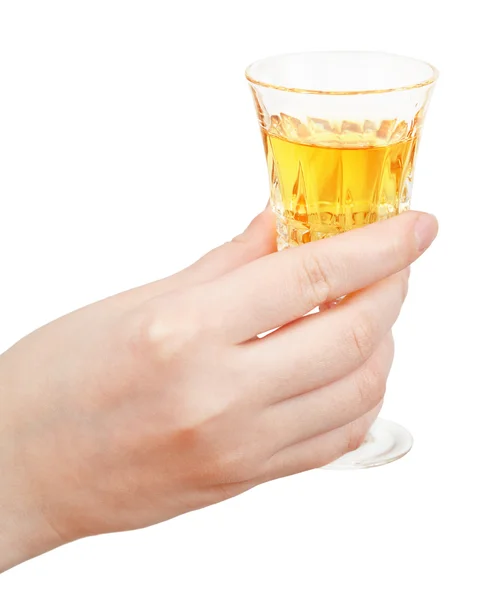 Hand holds glass of dessert wine isolated — Stock Photo, Image