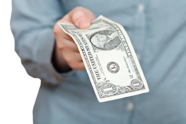 One dollar banknote in hand — Stock Photo, Image