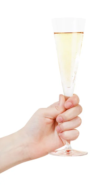 Mano solleva vetro con champagne — Foto Stock