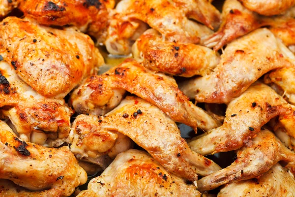 Ali di pollo piccante arrosto da vicino — Foto Stock