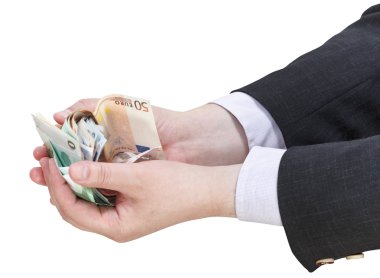 işadamı avuç içinde euro banknot yığını