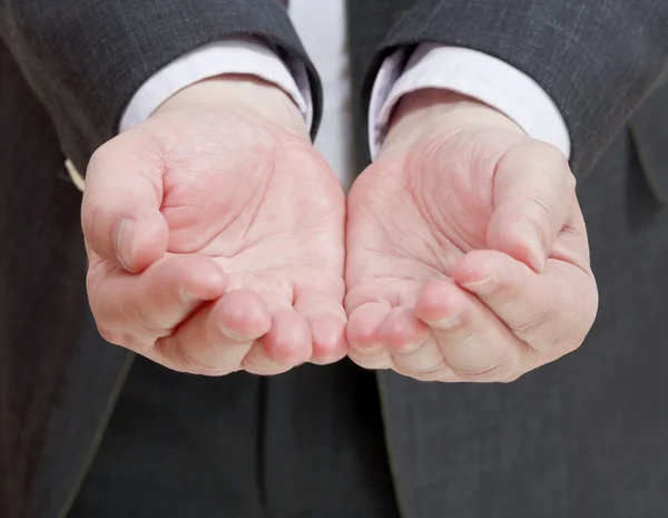 Framifrån av handfull från två palmer - hand gestur — Stockfoto