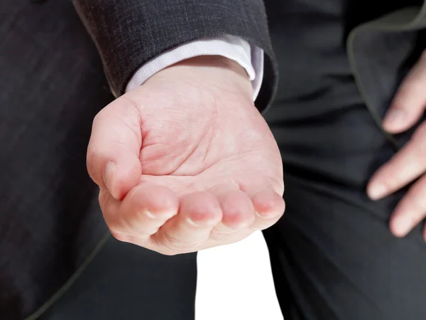 Business man holds handful - hand gesture — стоковое фото