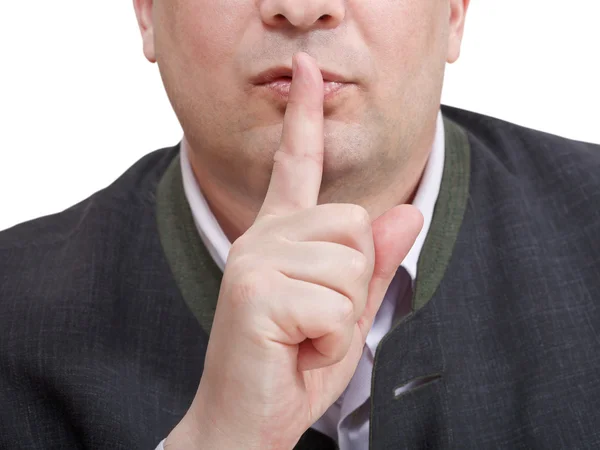 Der Finger des Geschäftsmannes in der Nähe der Lippen - Schweigezeichen — Stockfoto