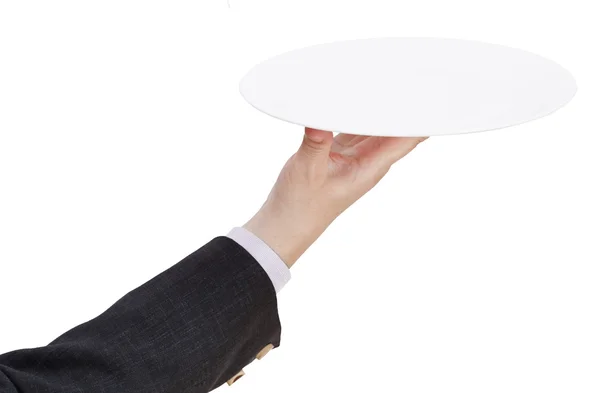 Вид сверху руки с пустой плоской белой тарелкой — стоковое фото
