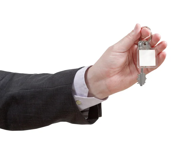 Male hand with blank door key ring close up — Stock Photo, Image