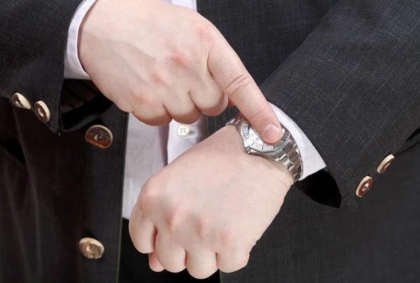 Man show exact time on wristwatch close up — Stock Photo, Image