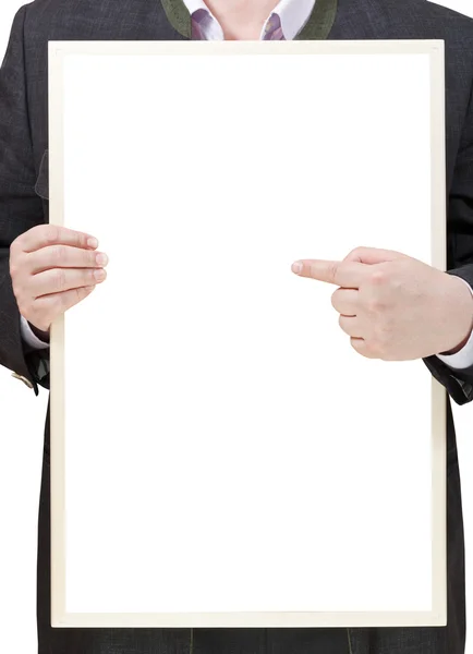 Salesman holds blank billboard in hands — Stock Photo, Image