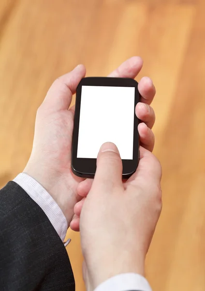 Mobiele telefoon scherm in zakenman handen uitgesneden — Stockfoto