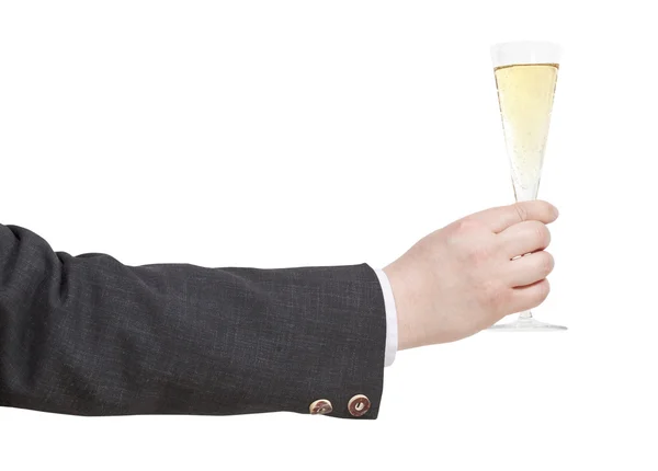 Zijaanzicht van champagne glas in zakenman hand — Stockfoto