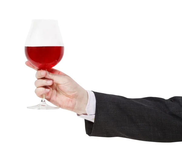 Synsvinkel på rødt vinglass i mannlig hånd – stockfoto