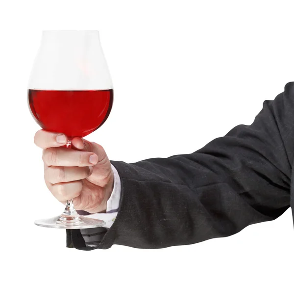 Toast withred vin glas i affärsman hand — Stockfoto