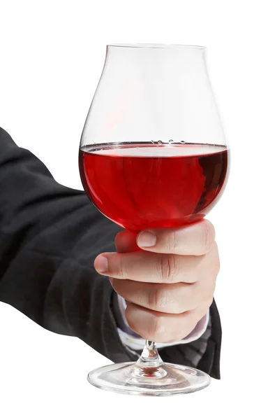 Vue de face du verre à vin rouge dans la main de l'homme d'affaires — Photo