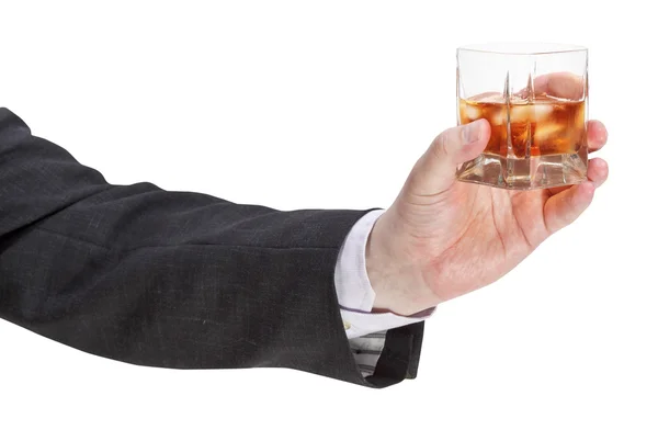 Vista lateral del vaso de whisky en mano de hombre de negocios —  Fotos de Stock