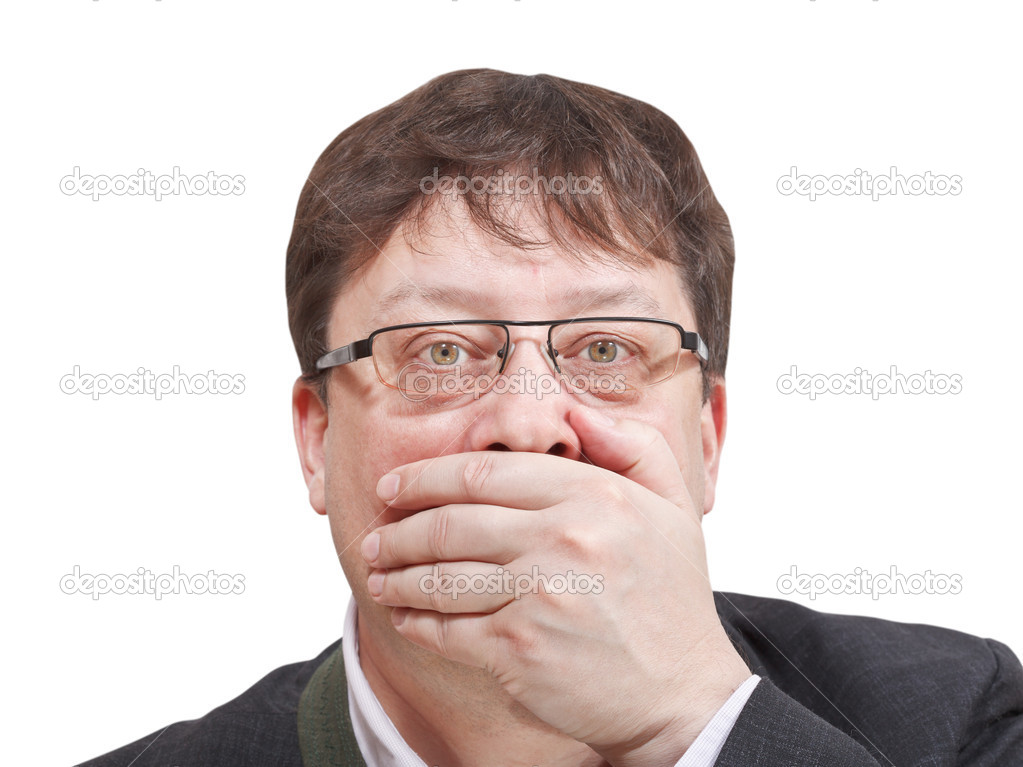 front view of businessman's hand closing mouth