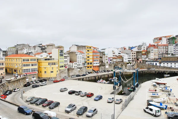 Urban port and car parking in town Malpica — Stock Photo, Image