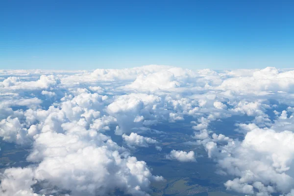 Above view of white clouds in blue sky — Stock Photo, Image