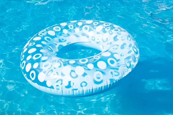 Blue inflatable swimming circle in open air pool — Stock Photo, Image