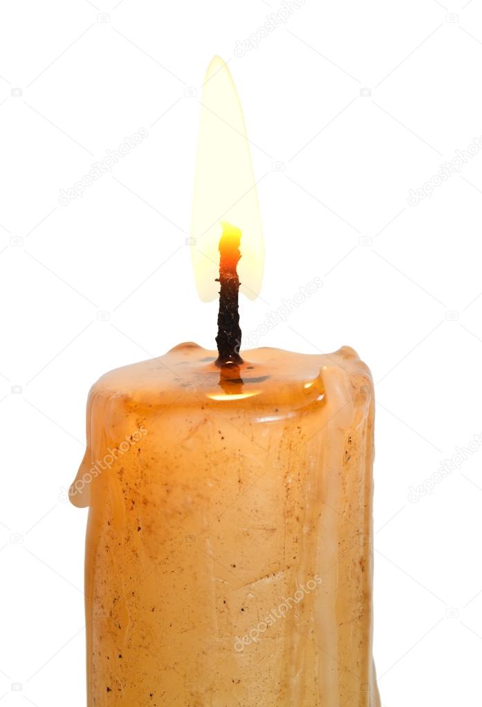 flame on lighted candle close up isolated