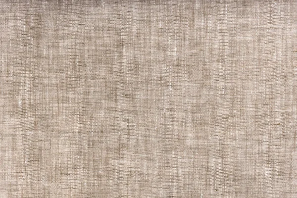 Doğal keten kumaşın tekstil arka planı. Yakın plan.