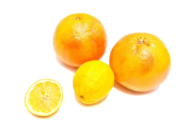 Two raw grapefruit and lemon — Stock Photo, Image