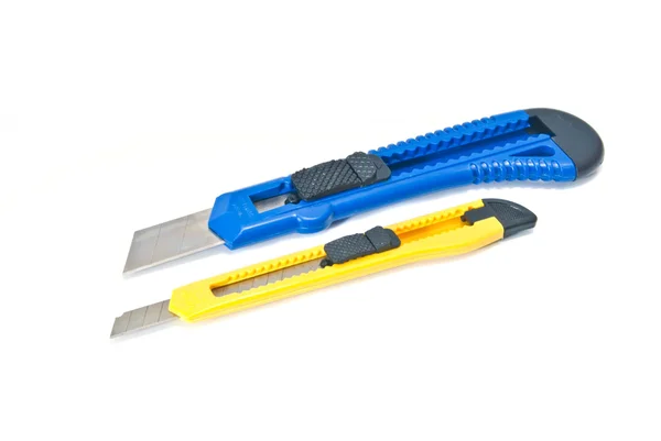 Blue and yellow stationary knife on a white — Stock Photo, Image