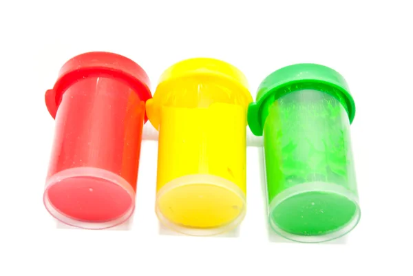 Tři láhve vody barev — Stock fotografie