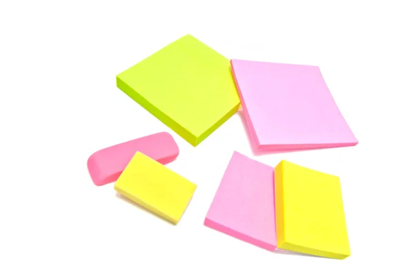 Sticky notes and erasers on white — Stock Photo, Image