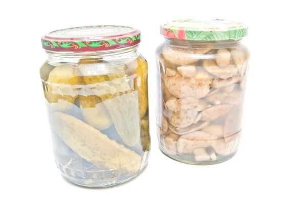 Two jars with marinated vegetables on white — Stock Photo, Image